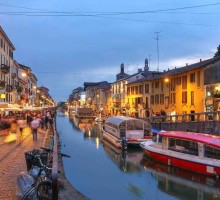 Evening scene along the Naviglio Grande canal in Milan, Italy.