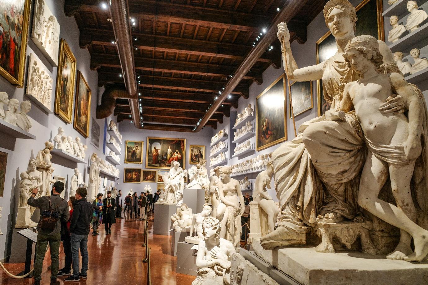 Religious artwork and marble sculptures in the Academy Gallery. Florence, Italy.