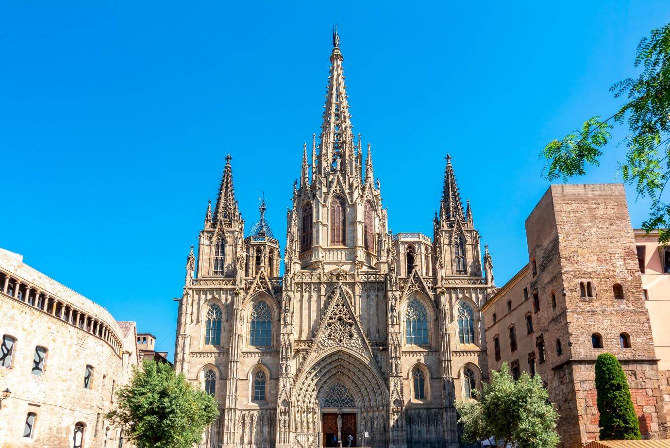 Front view of the Sagrada Família in Barcelona Spain on a sunny bright day.