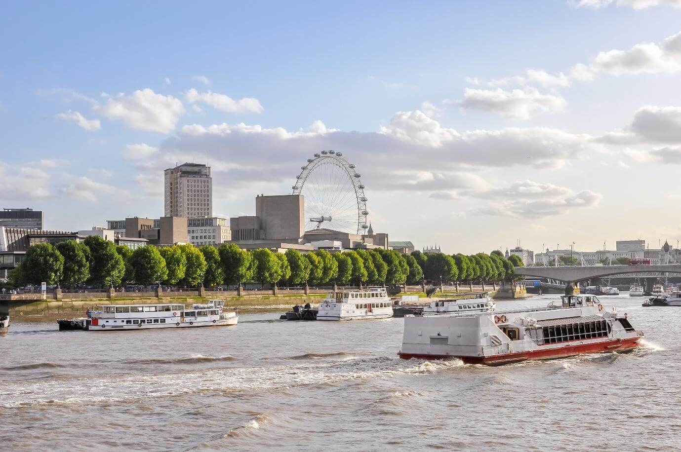 Boats on River Thames in London, United Kingdom.