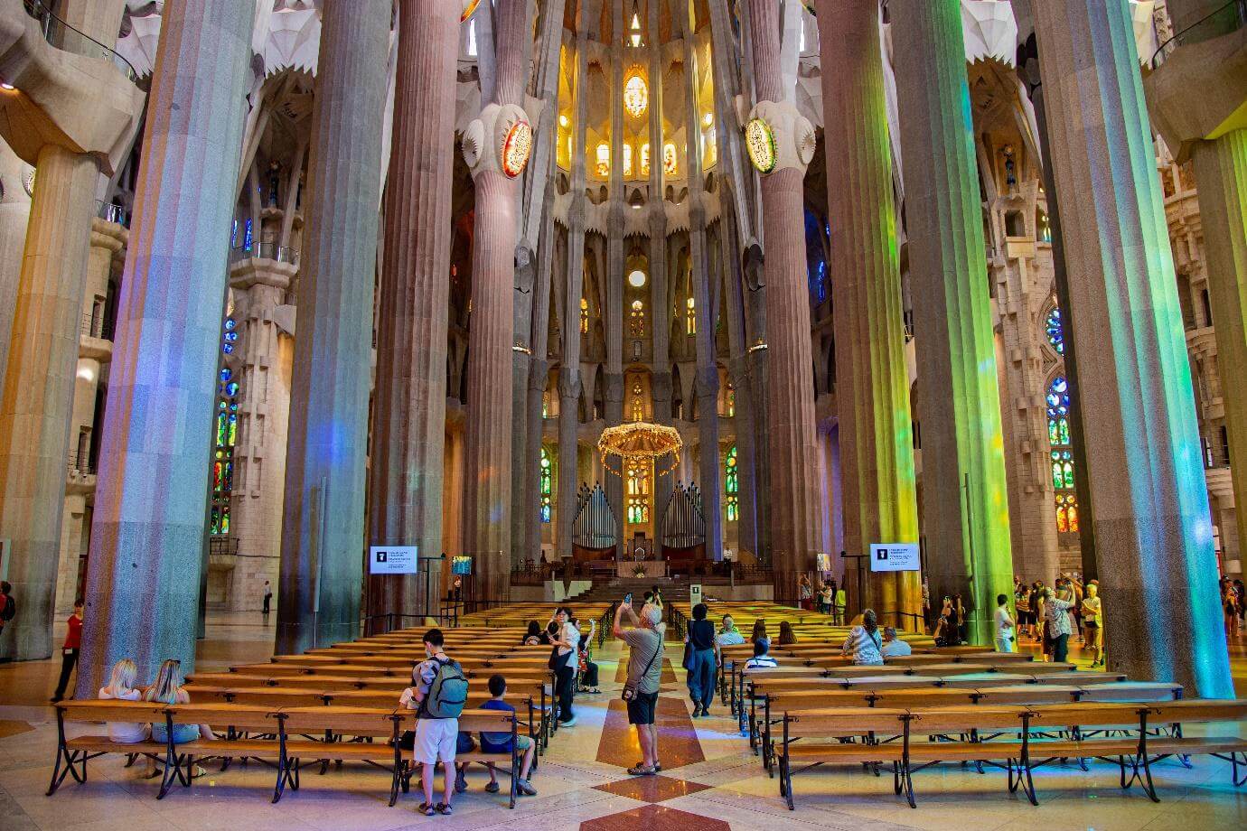 Sagrada Familia in Barcelona.Many tourists admire the light and shadow changes through the stained glass in the Sagrada Familia.